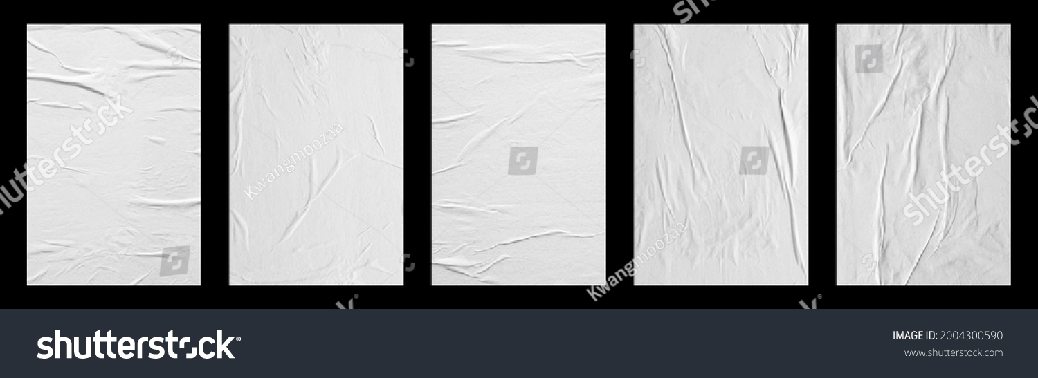 white crumpled and creased glued paper poster set isolated on black background #2004300590