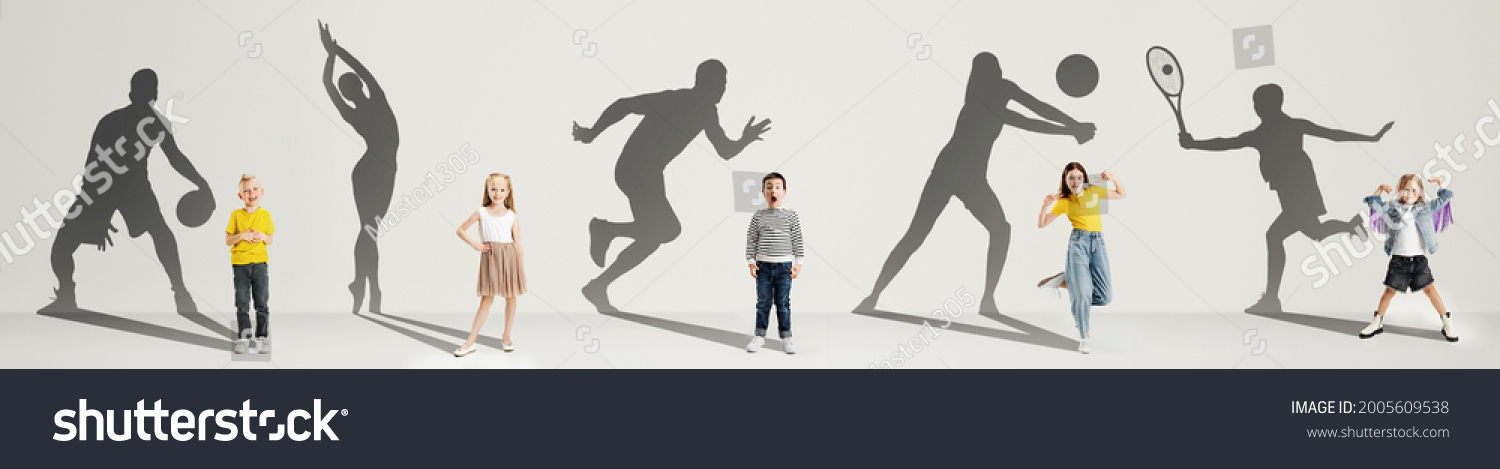 Collage. Dreams about big and famous future. Conceptual image with little boys and girls and shadows of professional sportsmen on gray background. Childhood, dreams, imagination, education concept. #2005609538