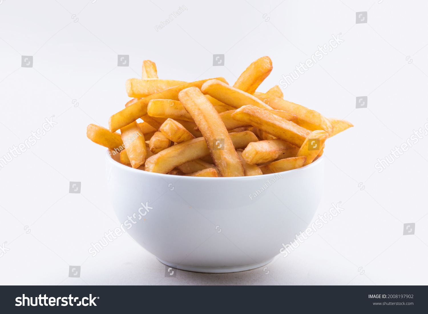 A bowl of crispy french fries isolated on white background.
 #2008197902