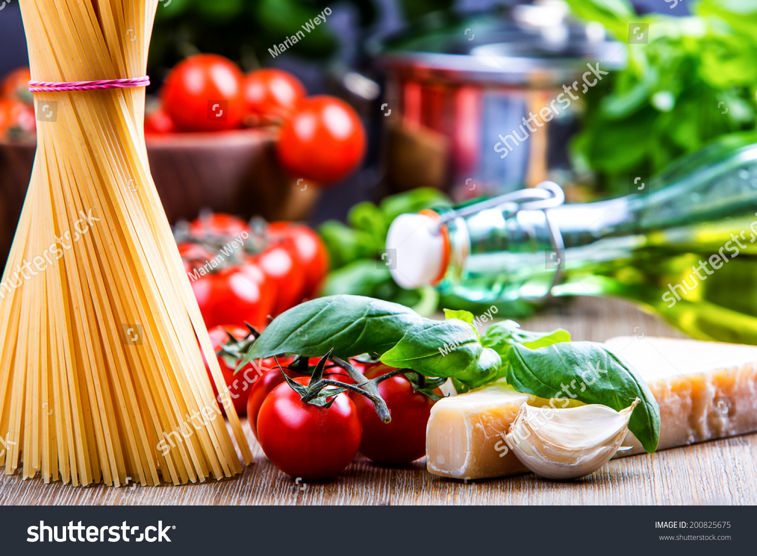 Spaghetti tomatoes basil garlic olive oil and parmesan cheese. #200825675