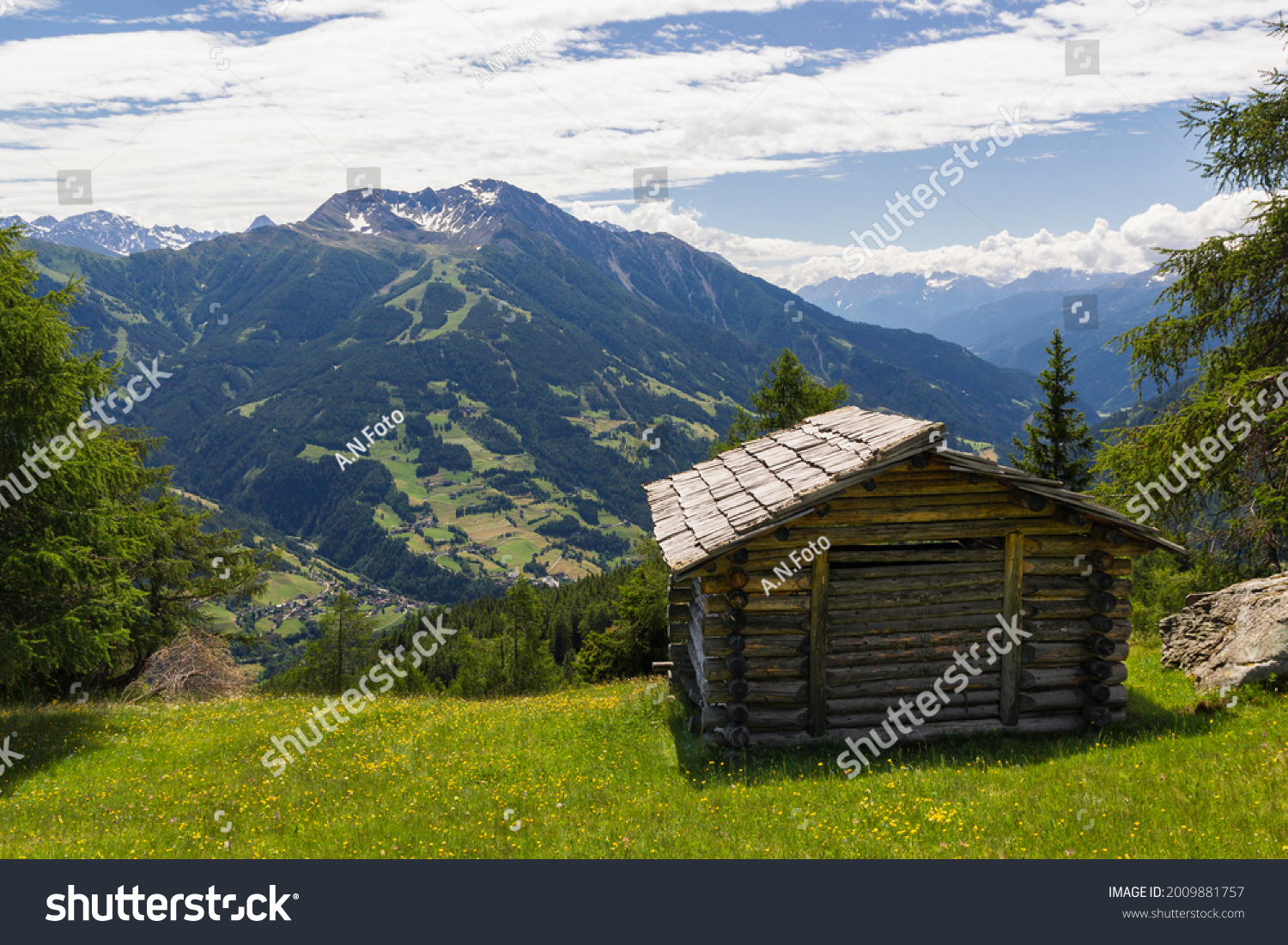 an old mountain hut in the middle of an beautiful grassland at the national park hohe tauern next to Matrei, Osttirol Austria  #2009881757