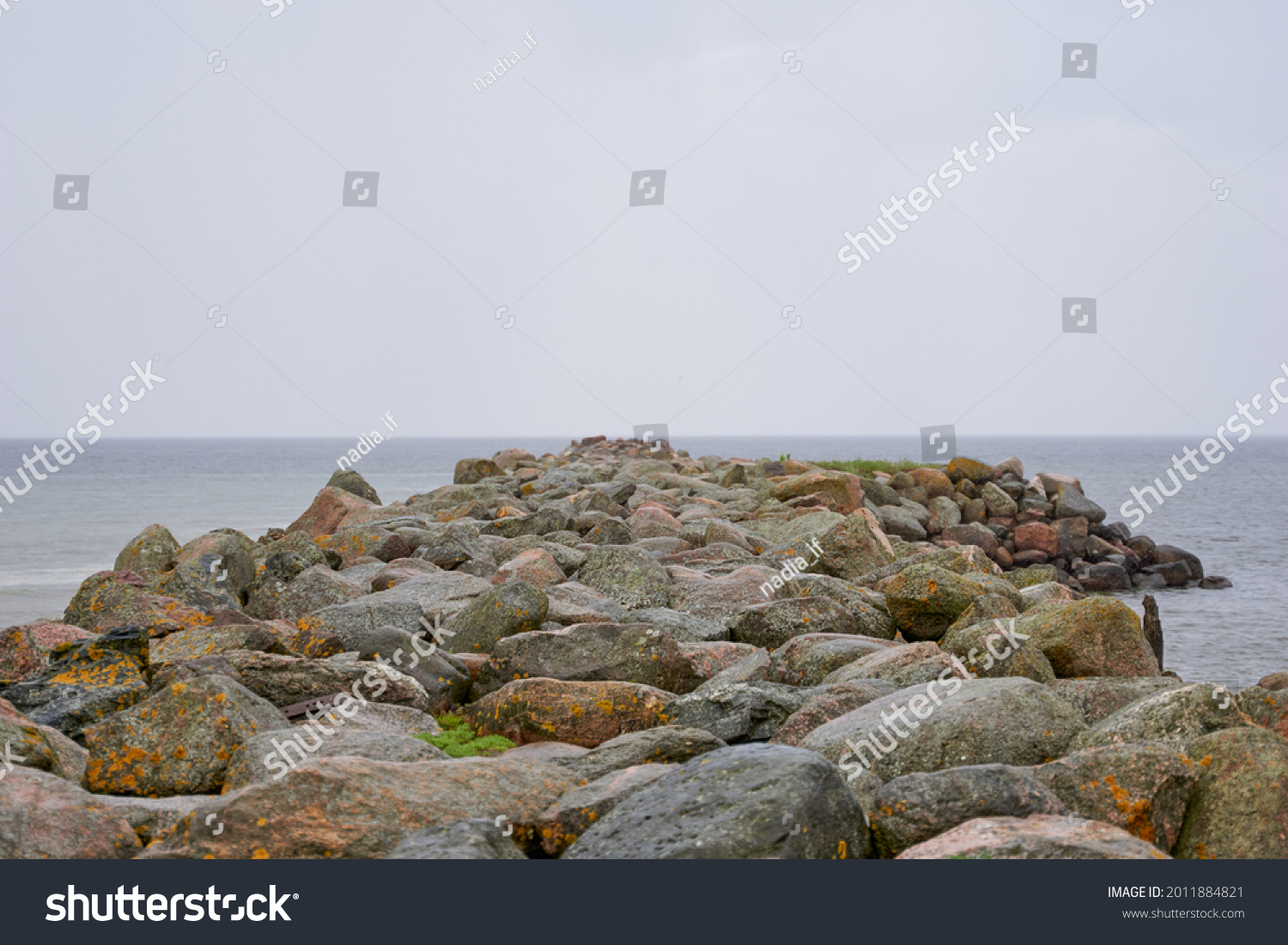 Rocky coastal landscape scene at shore of ocean. High quality photo #2011884821