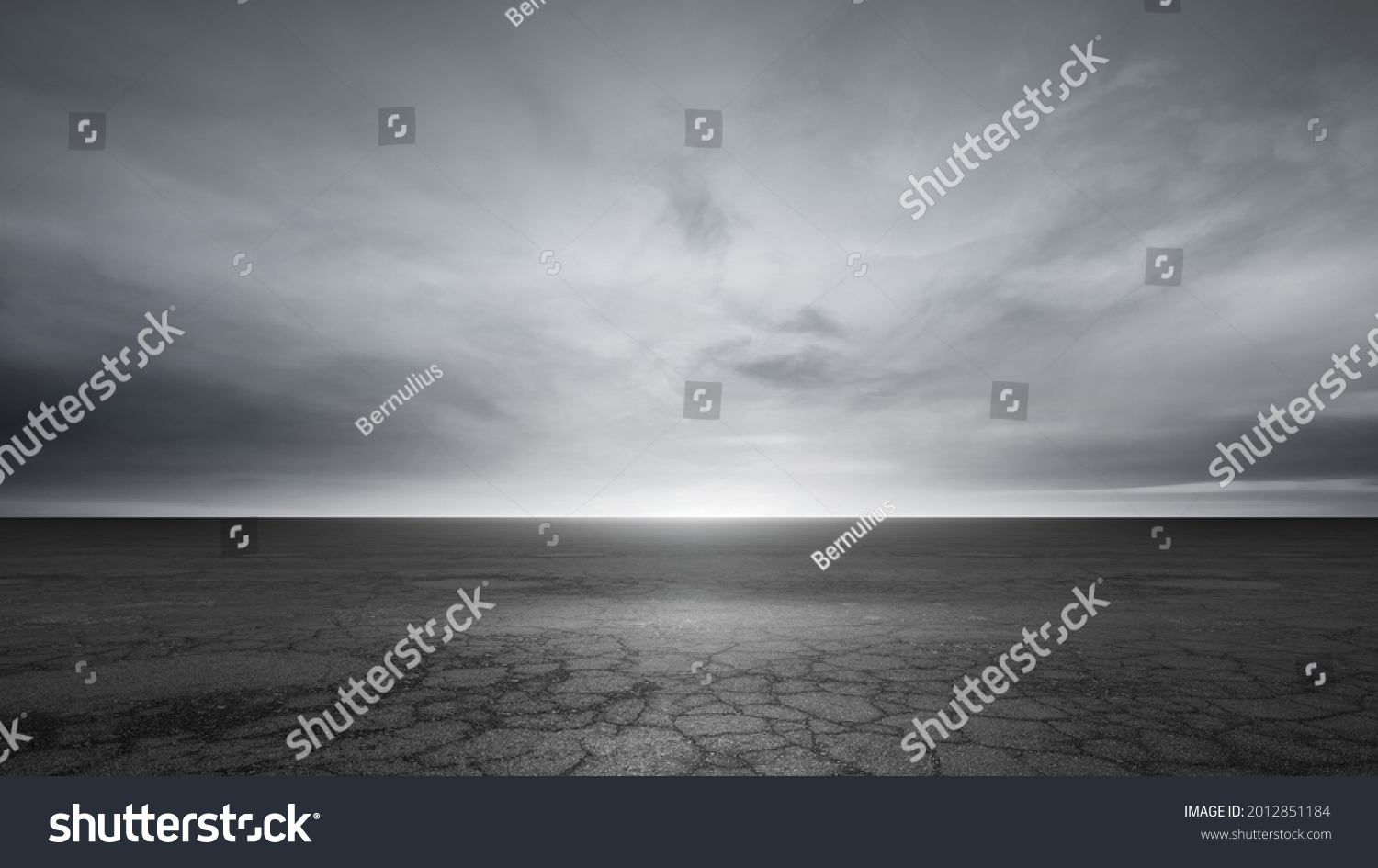 Dark Concrete Floor Background and Dramatic Gray Sky Clouds Horizon #2012851184