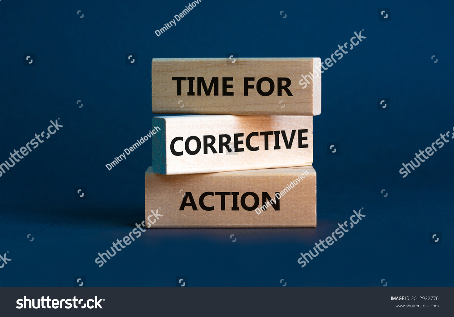 Time for corrective action symbol. Wooden blocks with words 'Time for corrective action' on a beautiful grey background. Business, time for corrective action concept. Copy space. #2012922776