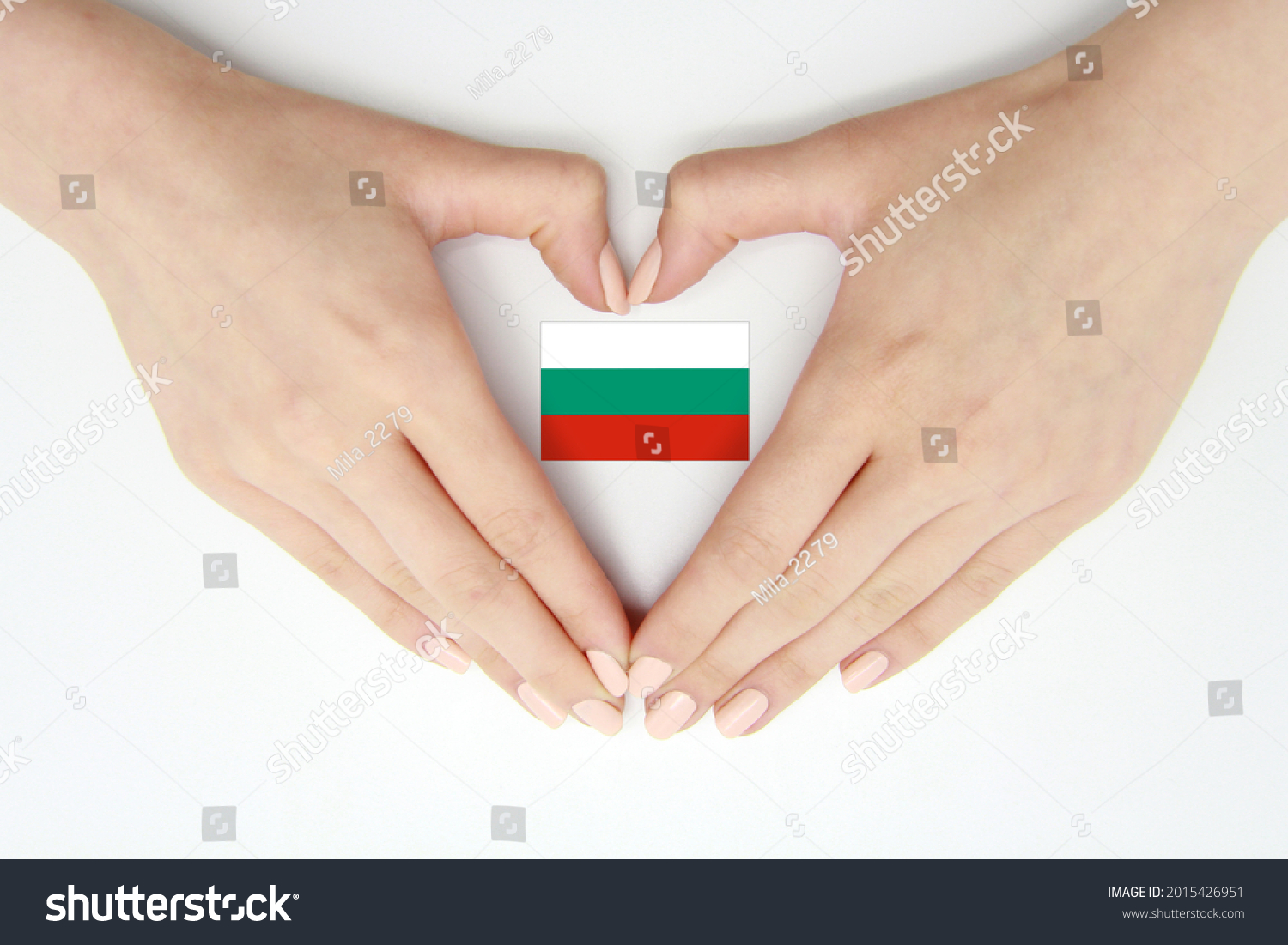 Women's hands create a heart inside the flag of Bulgaria on a white background.Background for postcards, articles for Flag Day, Independence Day,Unification Day of Bulgaria,travel,patriotism,tradition #2015426951