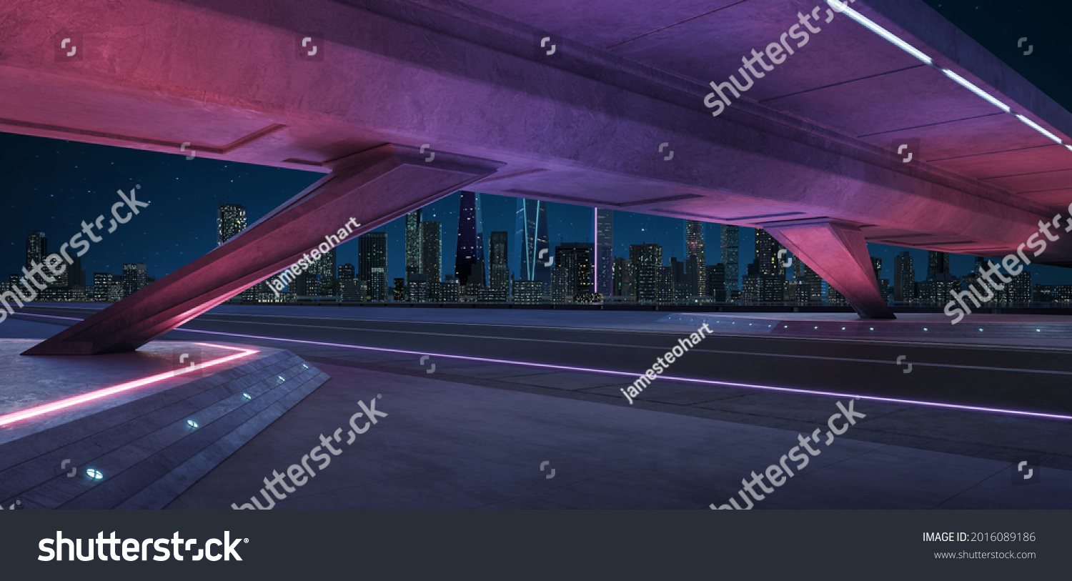 Empty asphalt road under the bridge during the night with beautiful city skyline background . #2016089186