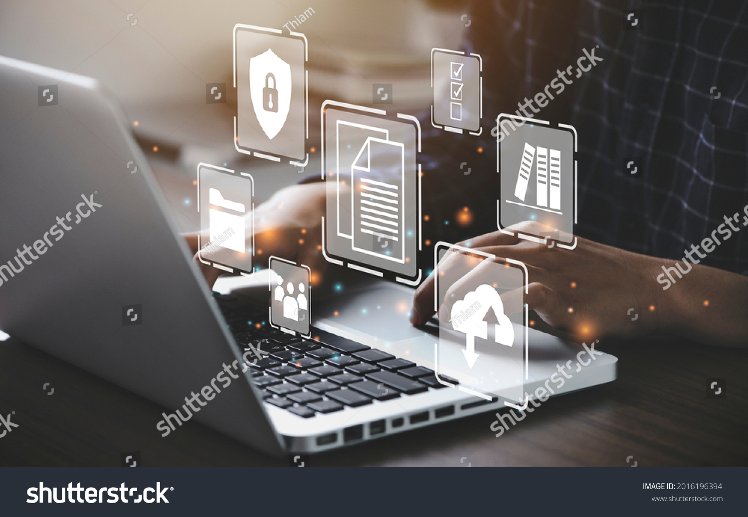 Businessman using a computer to document management concept, online documentation database and digital file storage system or software, records keeping, database technology, file access, doc sharing. #2016196394