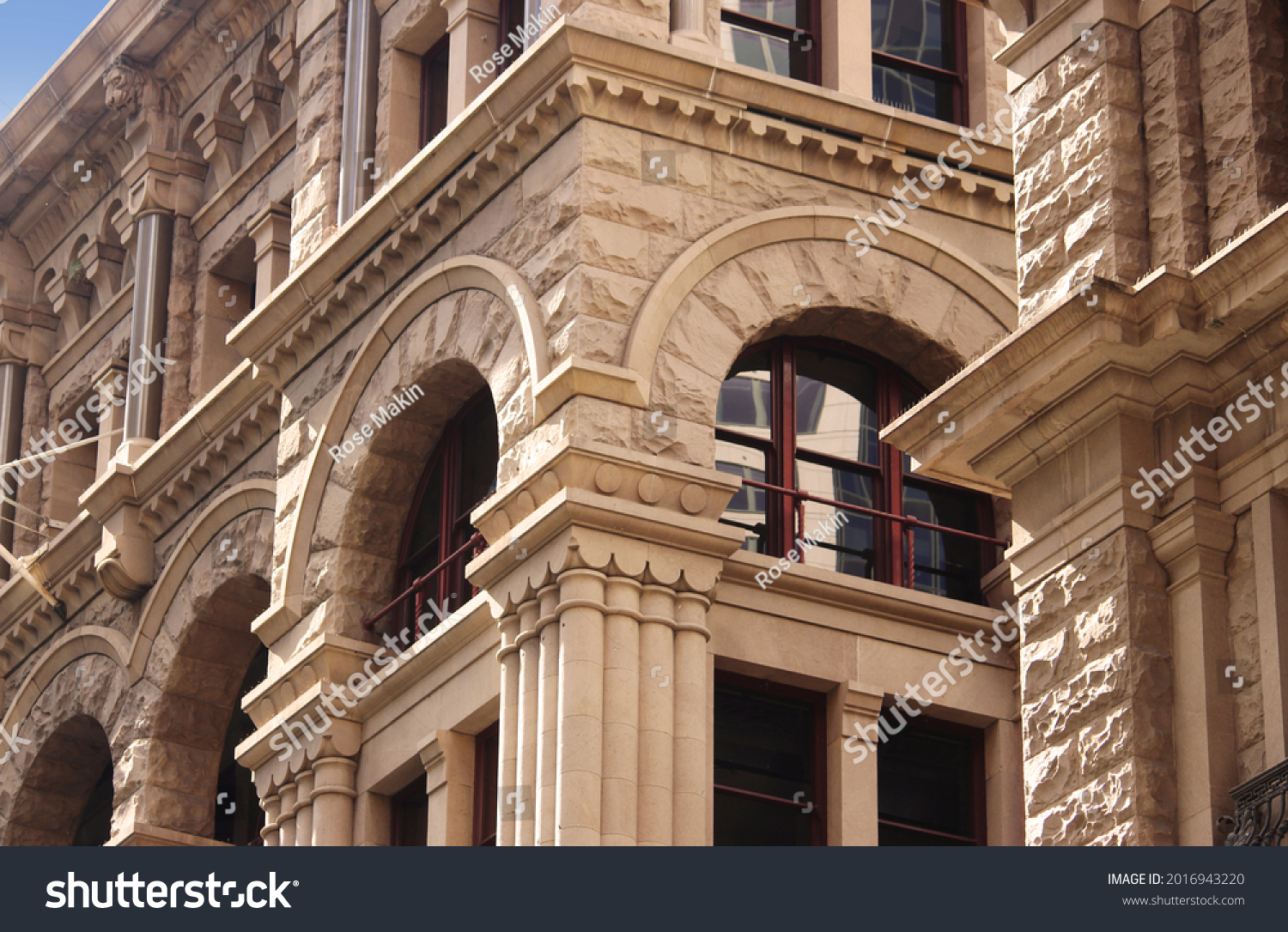 Close up of the architectural detailing of a refurbished heritage sandstone building. Now retail and office space. former headquarters for the American Equitable Life Assurance Society #2016943220