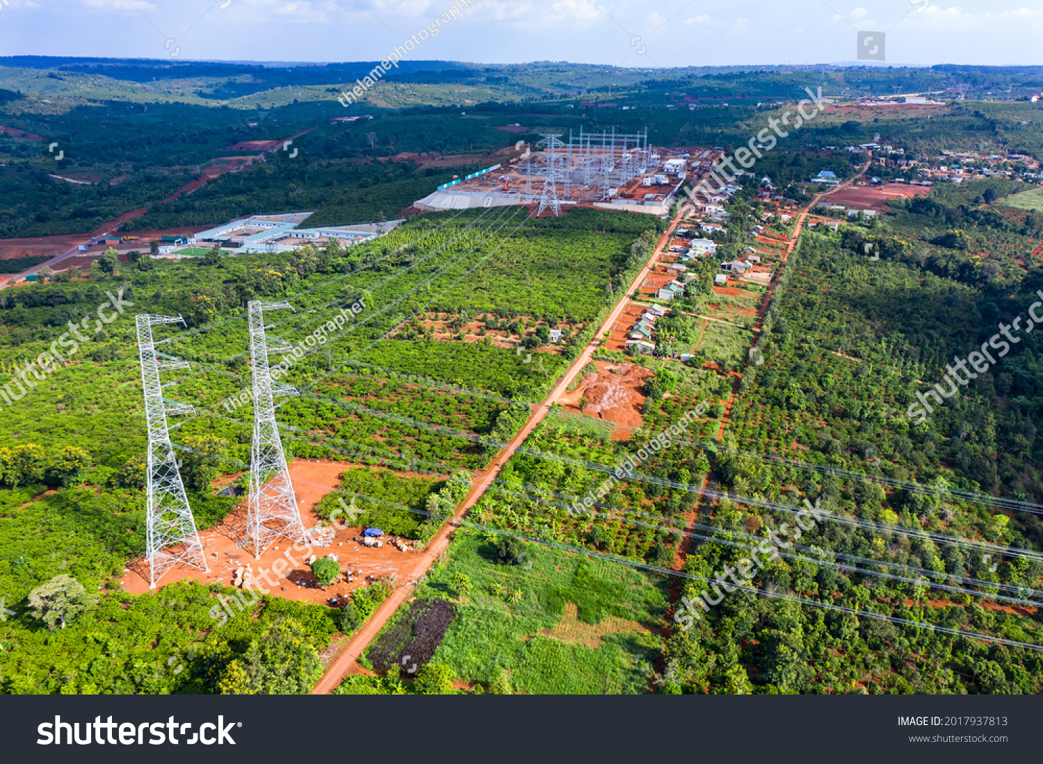 Electricity Pylon - Aerial view of UK standard overhead power line transmission tower under the mountainous area #2017937813