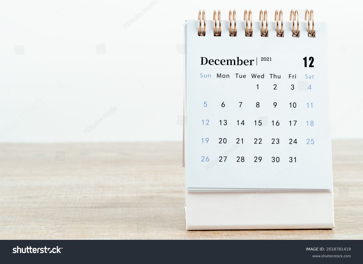 December Calendar 2021 on wooden table background. #2018781419