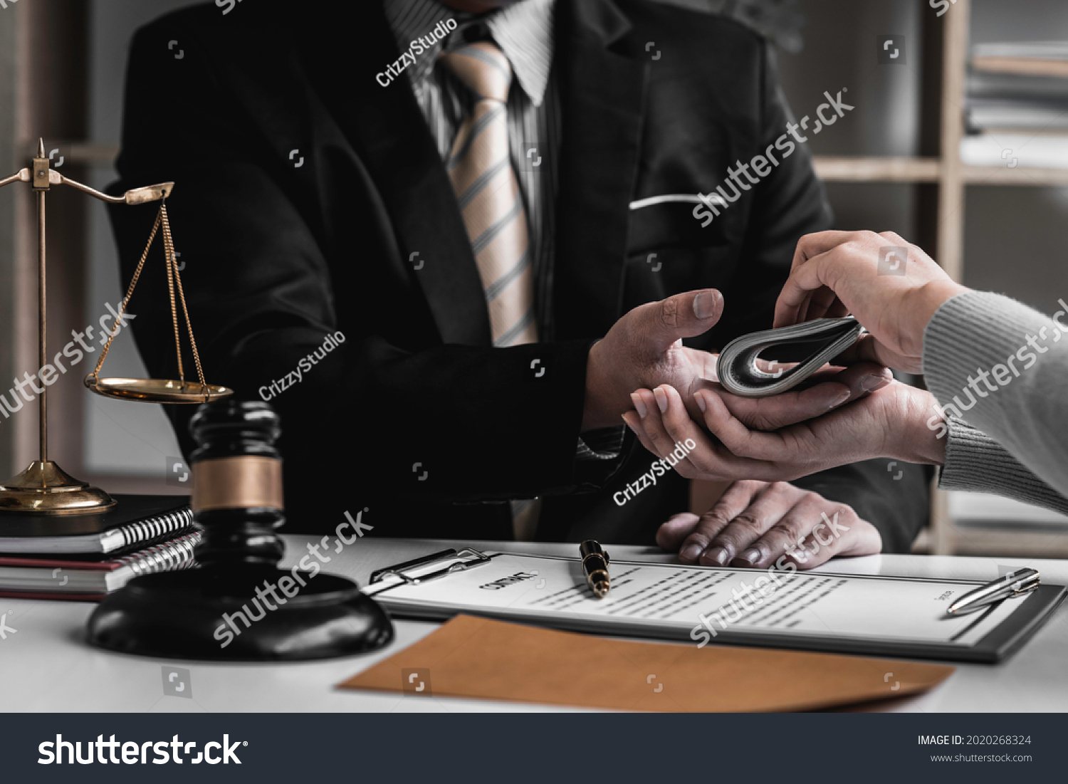 lawyer taking dollar bribe from the female client for falsifying documents, businessman taking bribes corruption illegal fraud bribery concept. #2020268324
