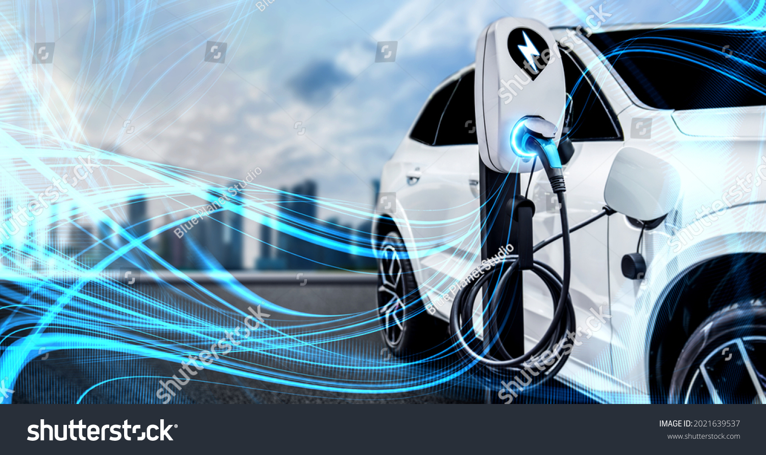 EV charging station for electric car in concept of green energy and eco power produced from sustainable source to supply to charger station in order to reduce CO2 emission . #2021639537