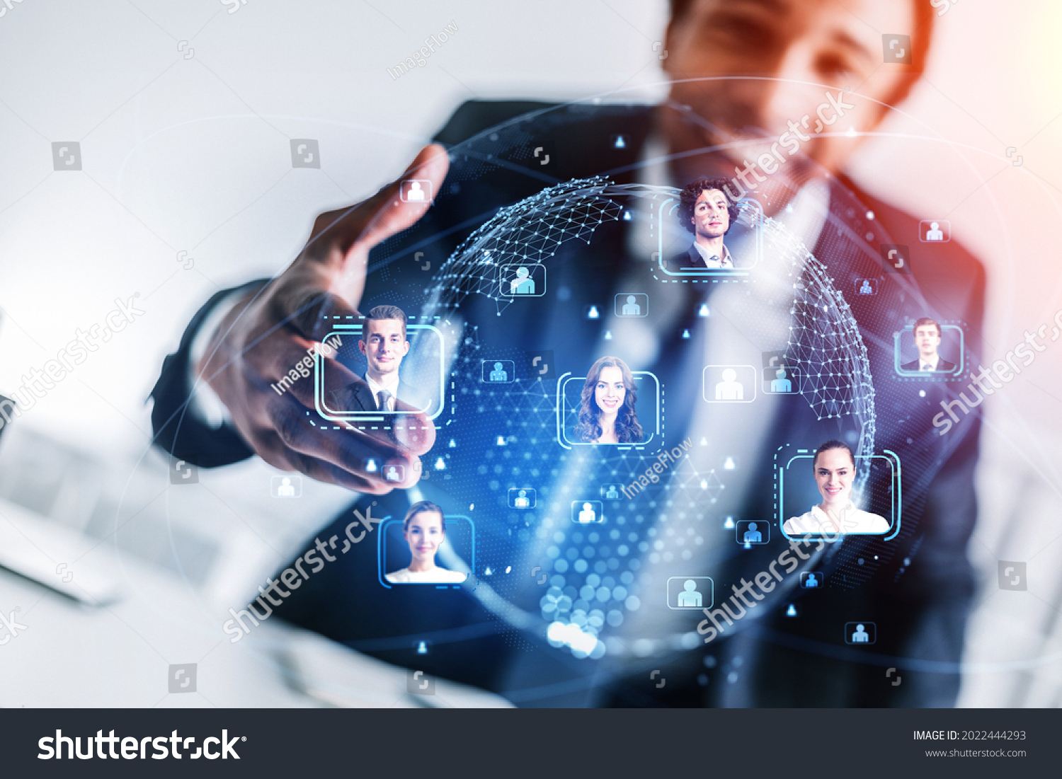 African American businessman holding out the hand for handshake as a concept of recruitment process for the international project. Social media people icons and hologram of worldwide globe #2022444293