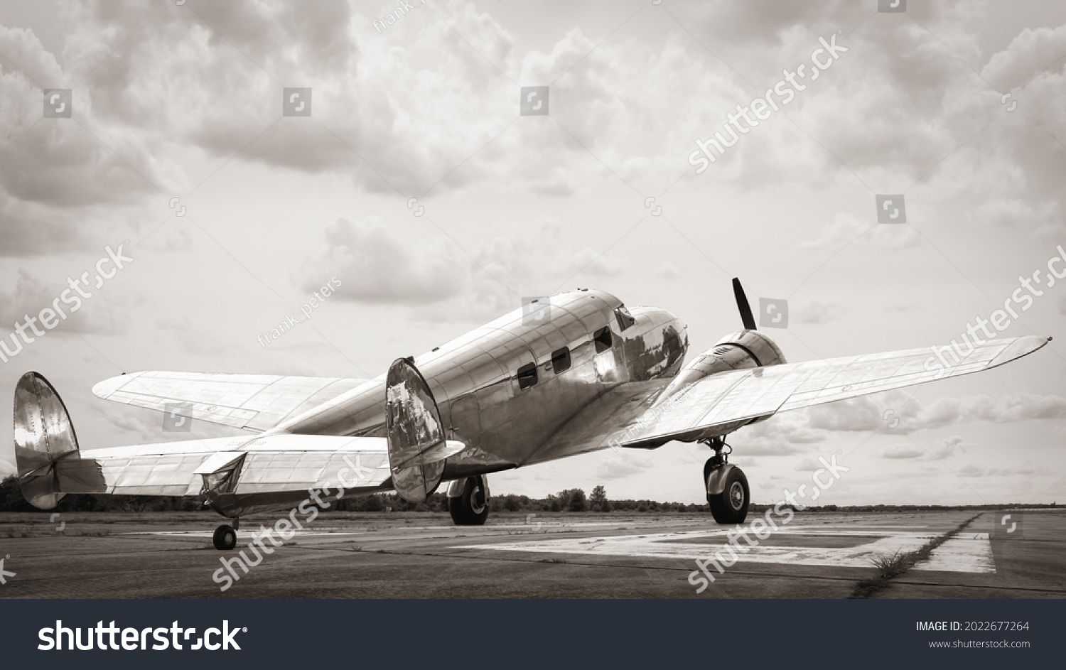 historical aircraft on a runway ready for take off #2022677264