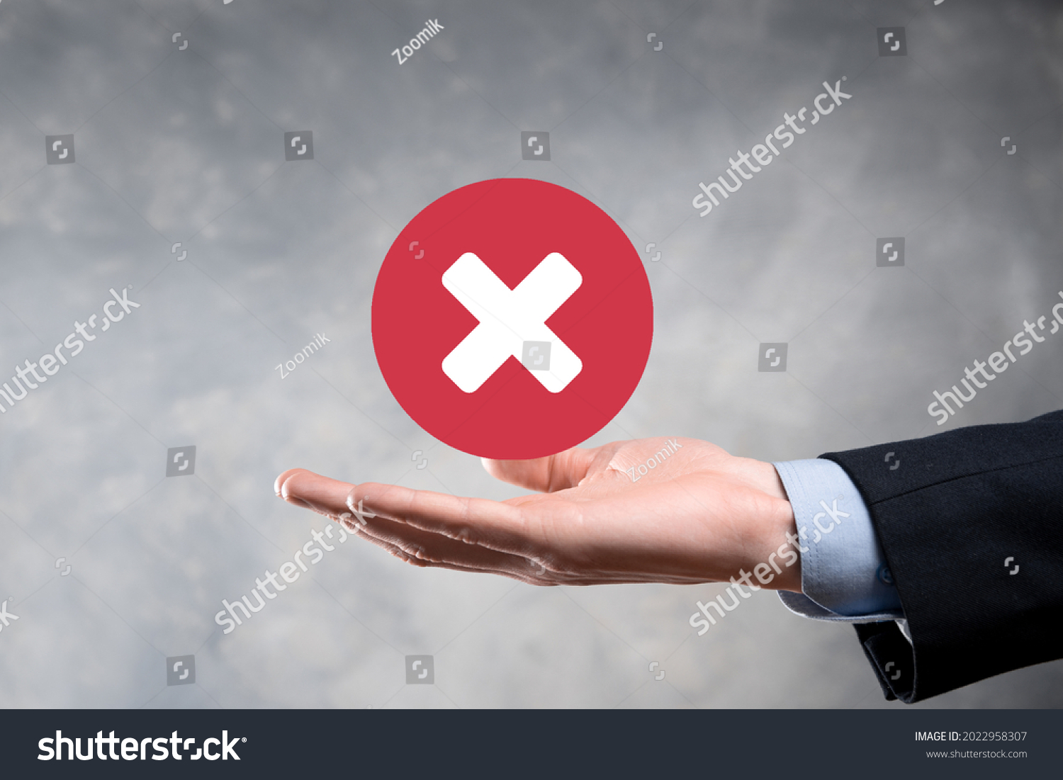 Hand holds icon,cancellation symbol,cancel icon.Cross mark flat red icon.round X mark.cancel button.Wrong.cross mark rejection.Declined.On dark background.Banner.Copy space.Place for text #2022958307