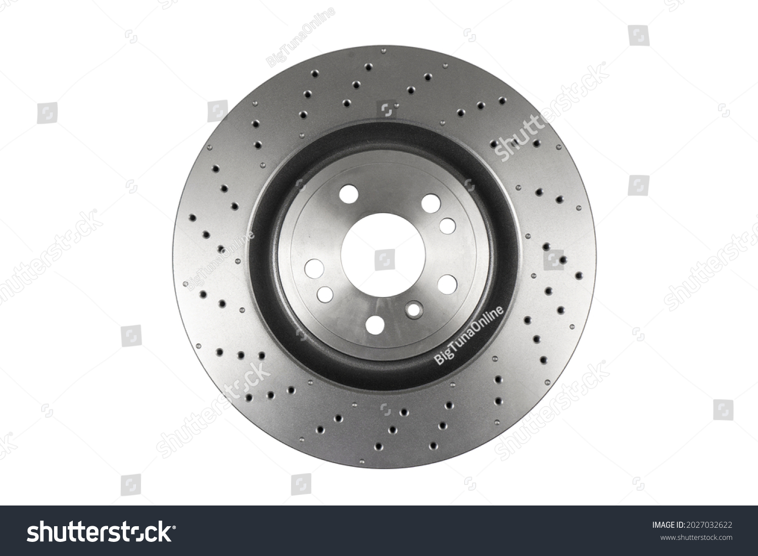 Car brake disc isolated on white background. Auto spare parts. Perforated brake disc rotor isolated on white. Braking ventilated discs. Quality spare parts for car service or maintenance #2027032622