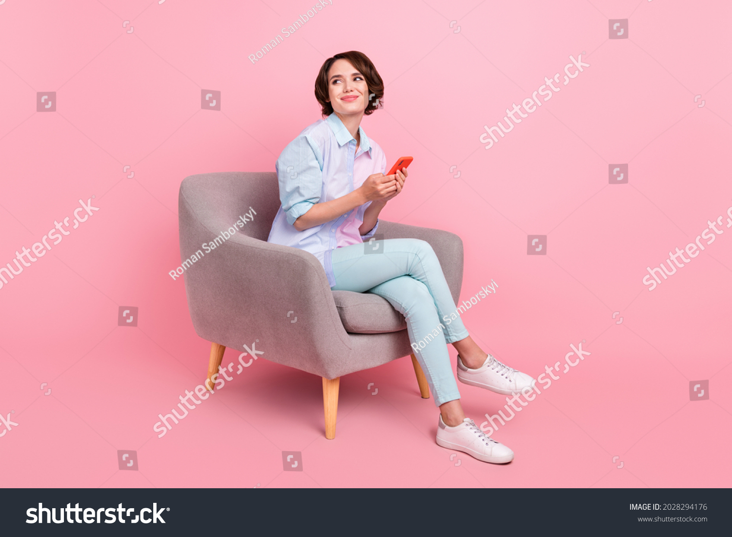 Full length body size photo woman sitting browsing internet on smartphone looking copyspace isolated pastel pink color background #2028294176