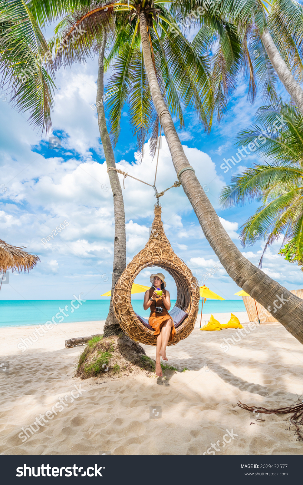 Summer lifestyle traveler woman relaxing on straw nests joy nature view landscape vacation luxury beach, Attraction place leisure tourist travel Thailand holiday, Tourism beautiful destination Asia #2029432577