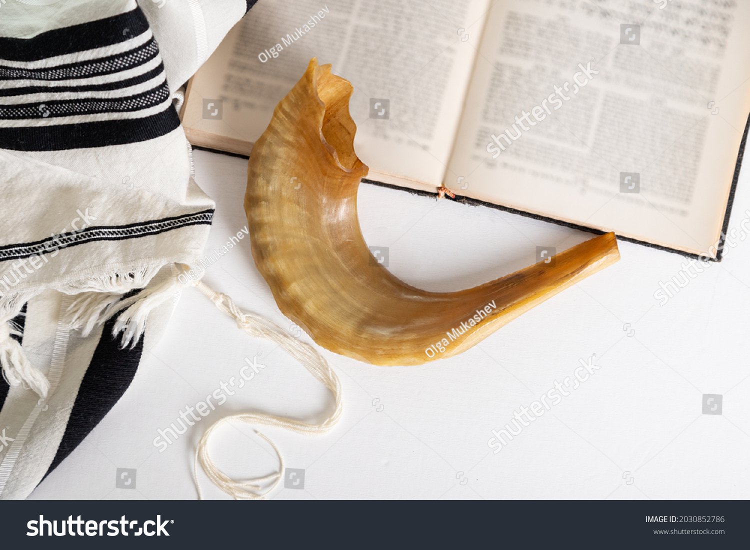 Religion image of Shofar (horn), Tallit (Prayer Shawl)  and Prayer book religious symbols. Rosh hashanah (jewish New Year holiday), Shabbat and Yom kippur concept. #2030852786