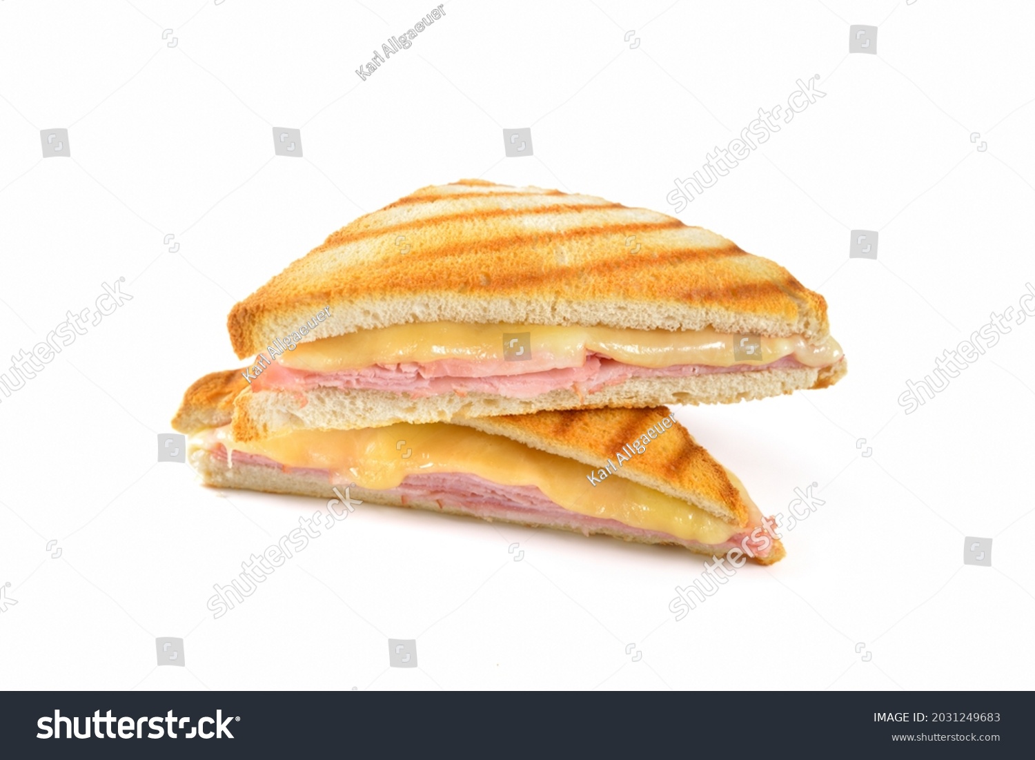  Pressed and toasted sandwich with ham and cheese on white background #2031249683