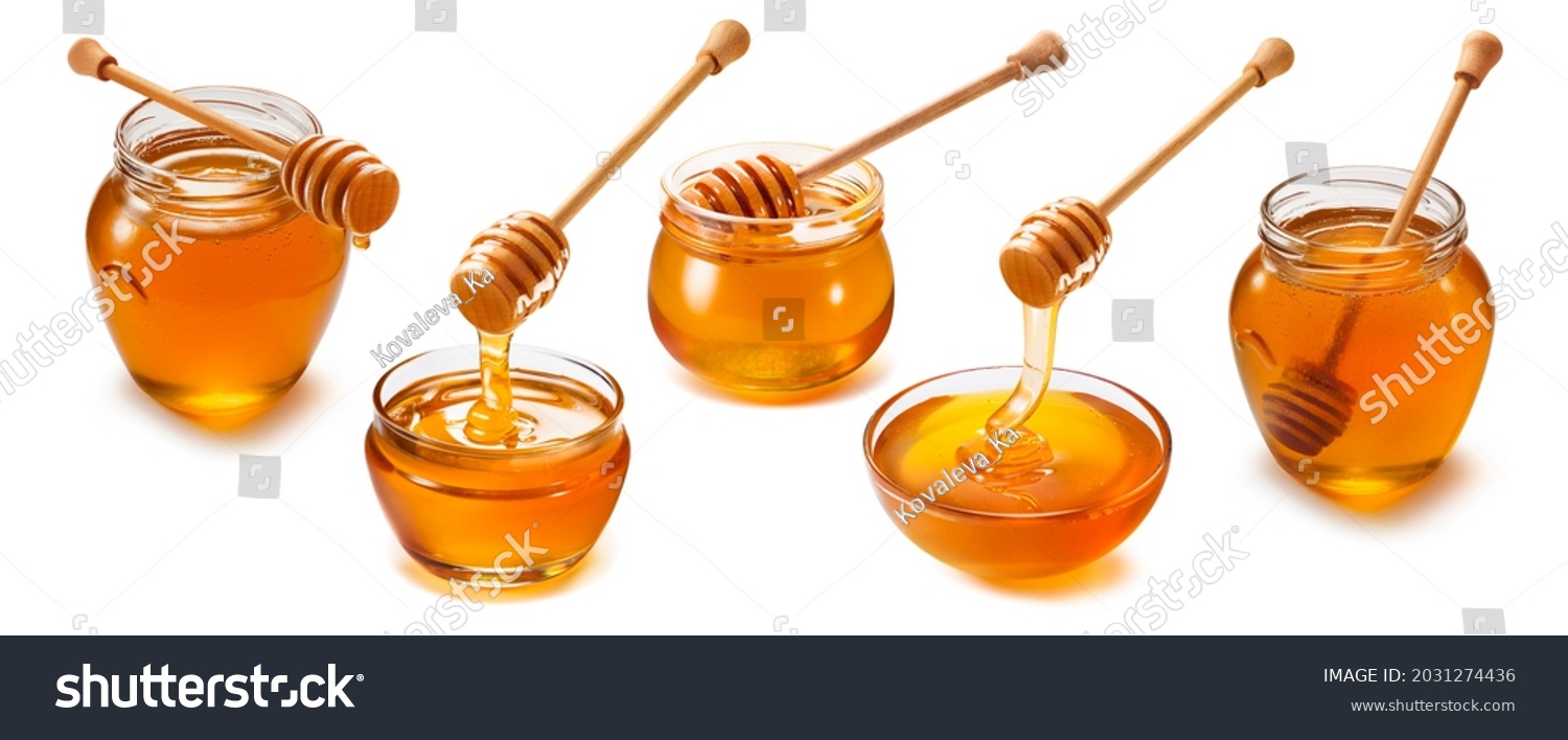Honey jars, cups and dippers set isolated on white background. Package design elements with clipping path #2031274436