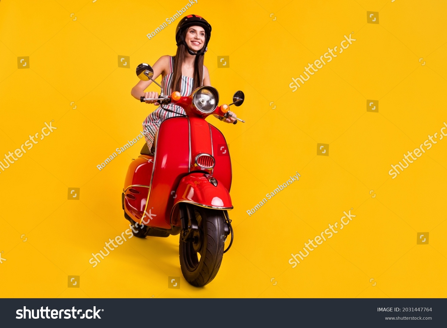 Full length body size photo smiling girl riding motorbike looking blank space isolated vivid yellow color background #2031447764