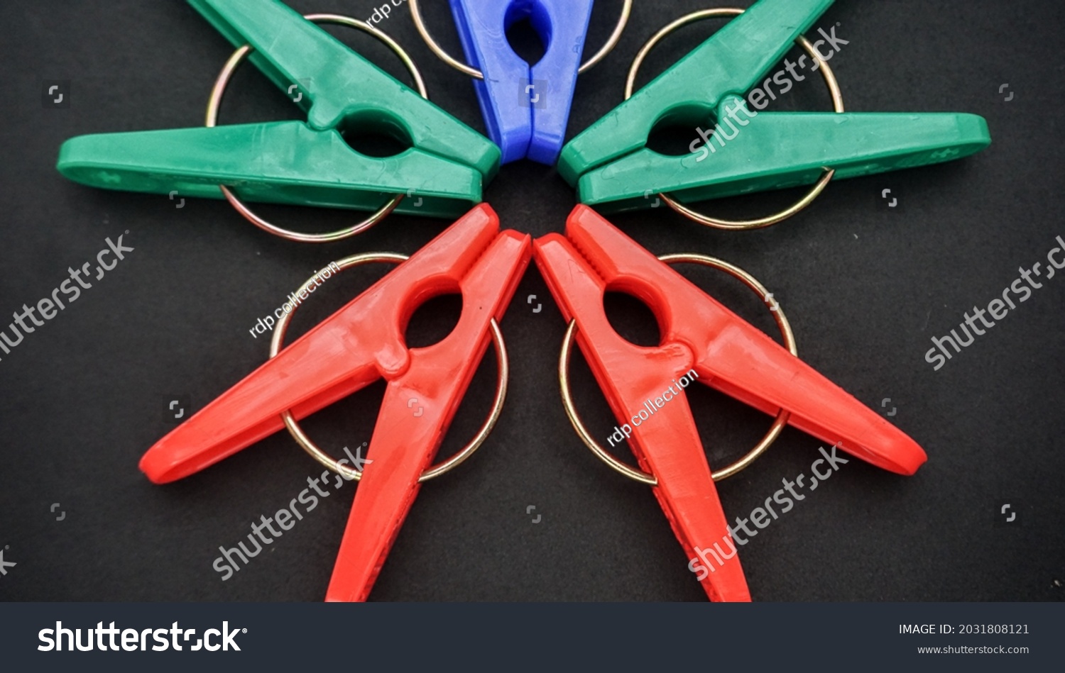 The clothespins are made of plastic with a little additional iron attachment, and there are many color options. #2031808121