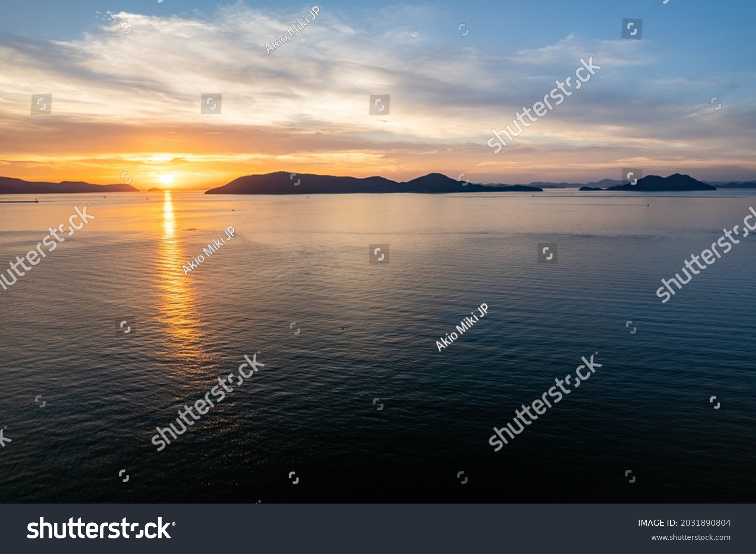 Tropical Landscape of Sea or Ocean and Waves at Sunset in Evening in Summer, Seto Inland Sea in Kagawa Prefecture in Japan, Travel or Trip, Aerial Top View from Flying Drone #2031890804