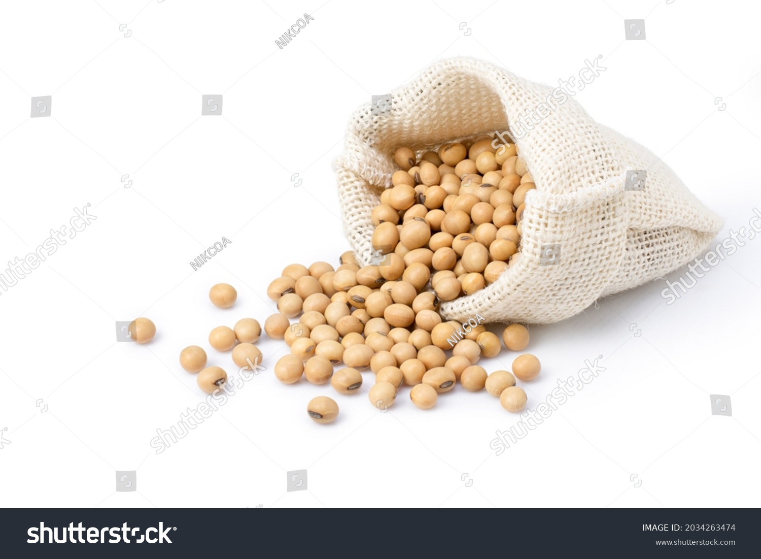 Soybeans in sack bag isolated on white background. #2034263474