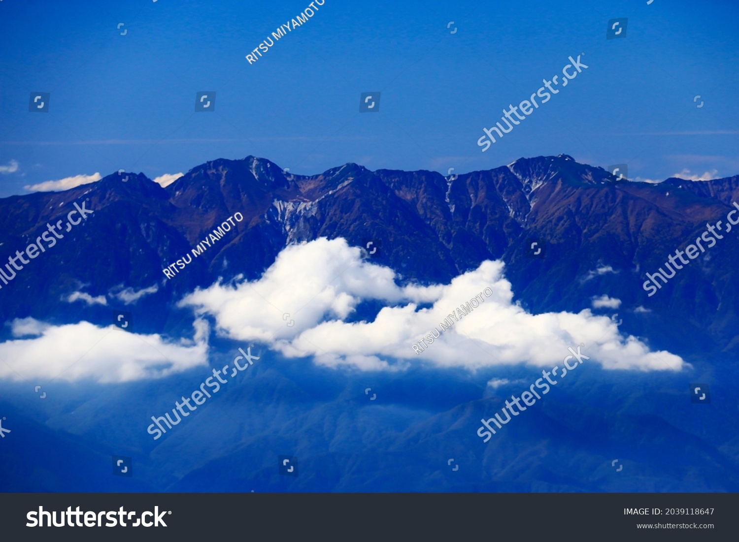 superb view of central alps from the summit of Mt.Shiomi in the Southern Alps,ina city,nagano prefecture,japan. #2039118647