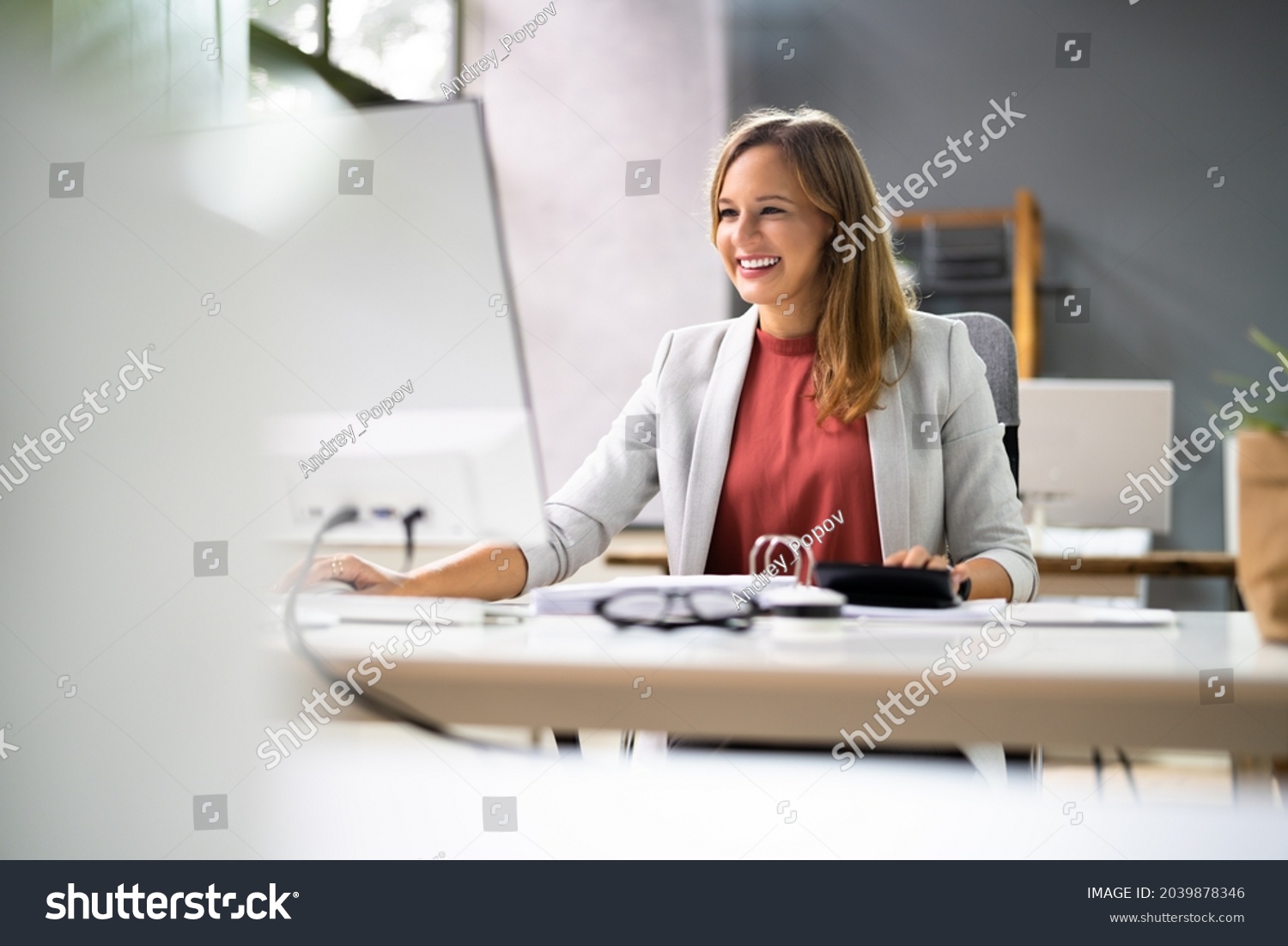 Accountant Women At Desk Using Calculator For Accounting #2039878346