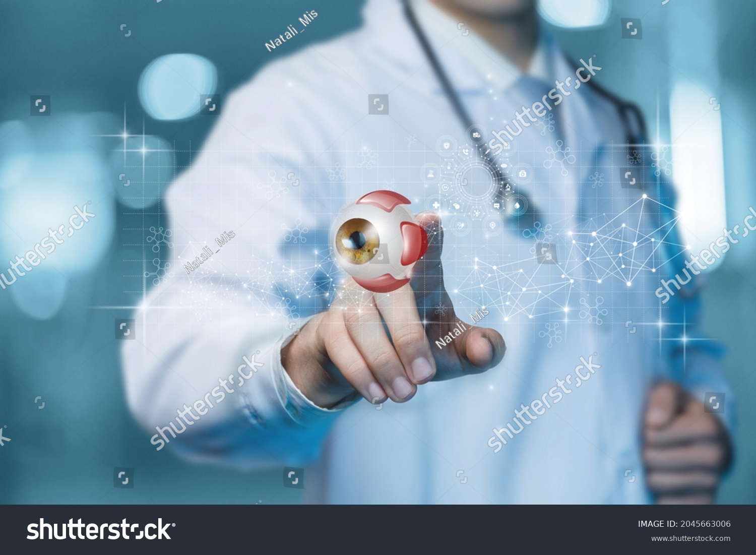 Doctor ophthalmologist clicks on a virtual computer screen on a model eye. #2045663006