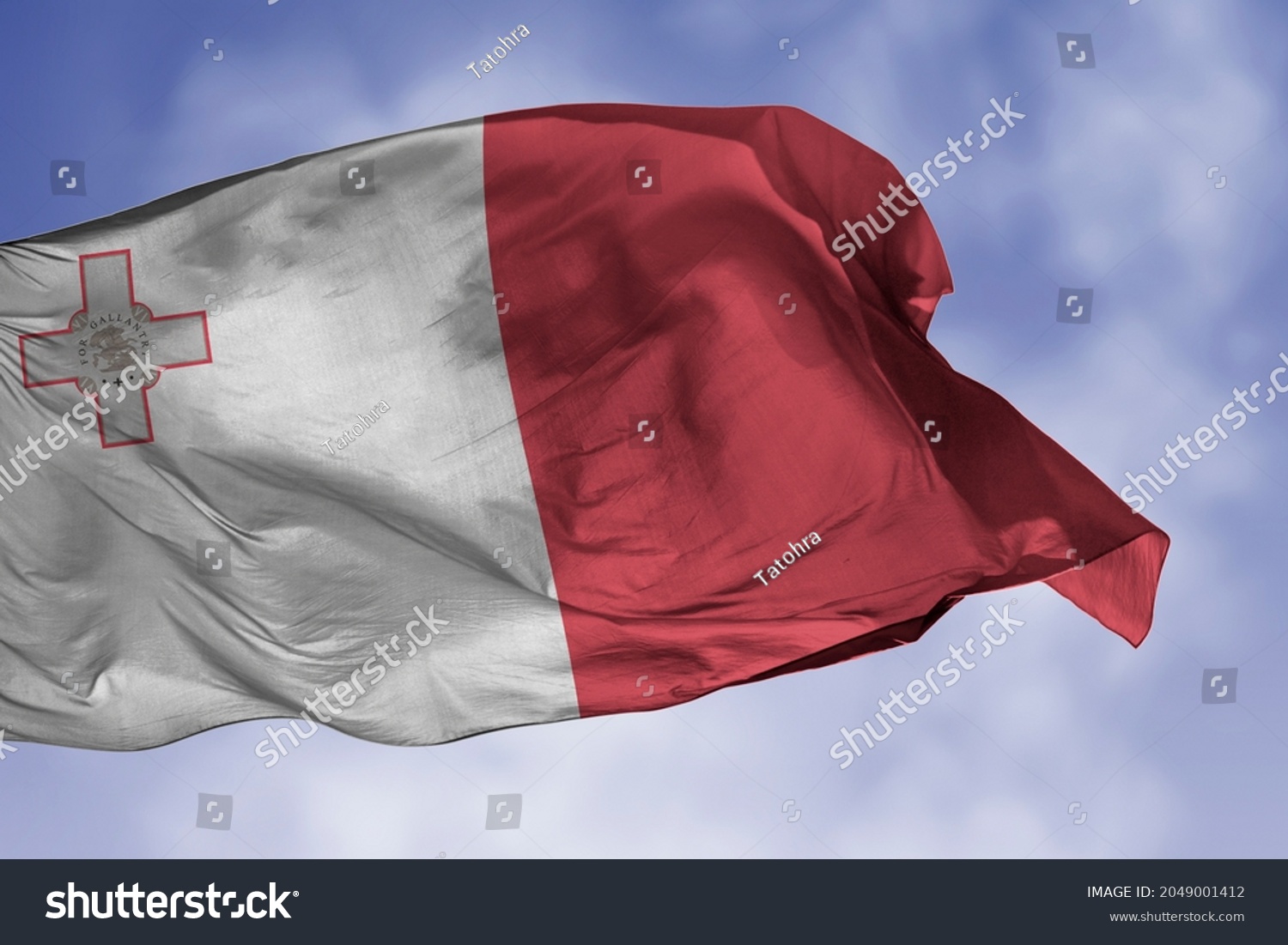 Malta flag isolated on the blue sky with clipping path. close up waving flag of Malta. flag symbols of Maltese. #2049001412