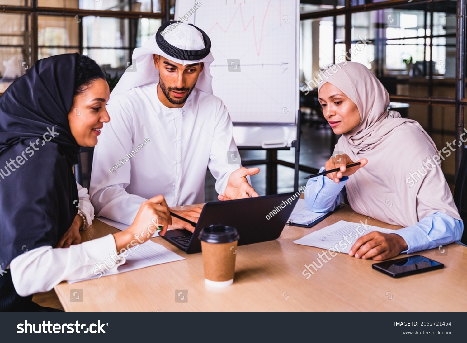 Multiethnic corporate business team meeting in the office for a strategic marketing plan - Office workers, entrepreneurs and company employee at work in a multinational company #2052721454