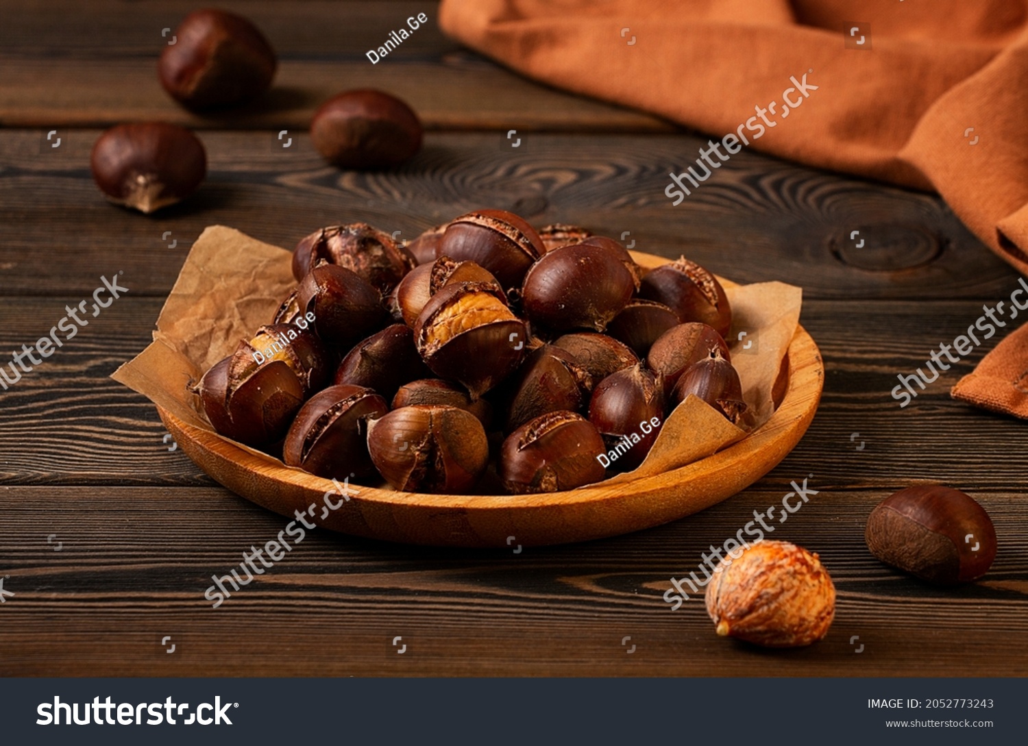 Roasted chestnut, on a wooden table, no people, #2052773243