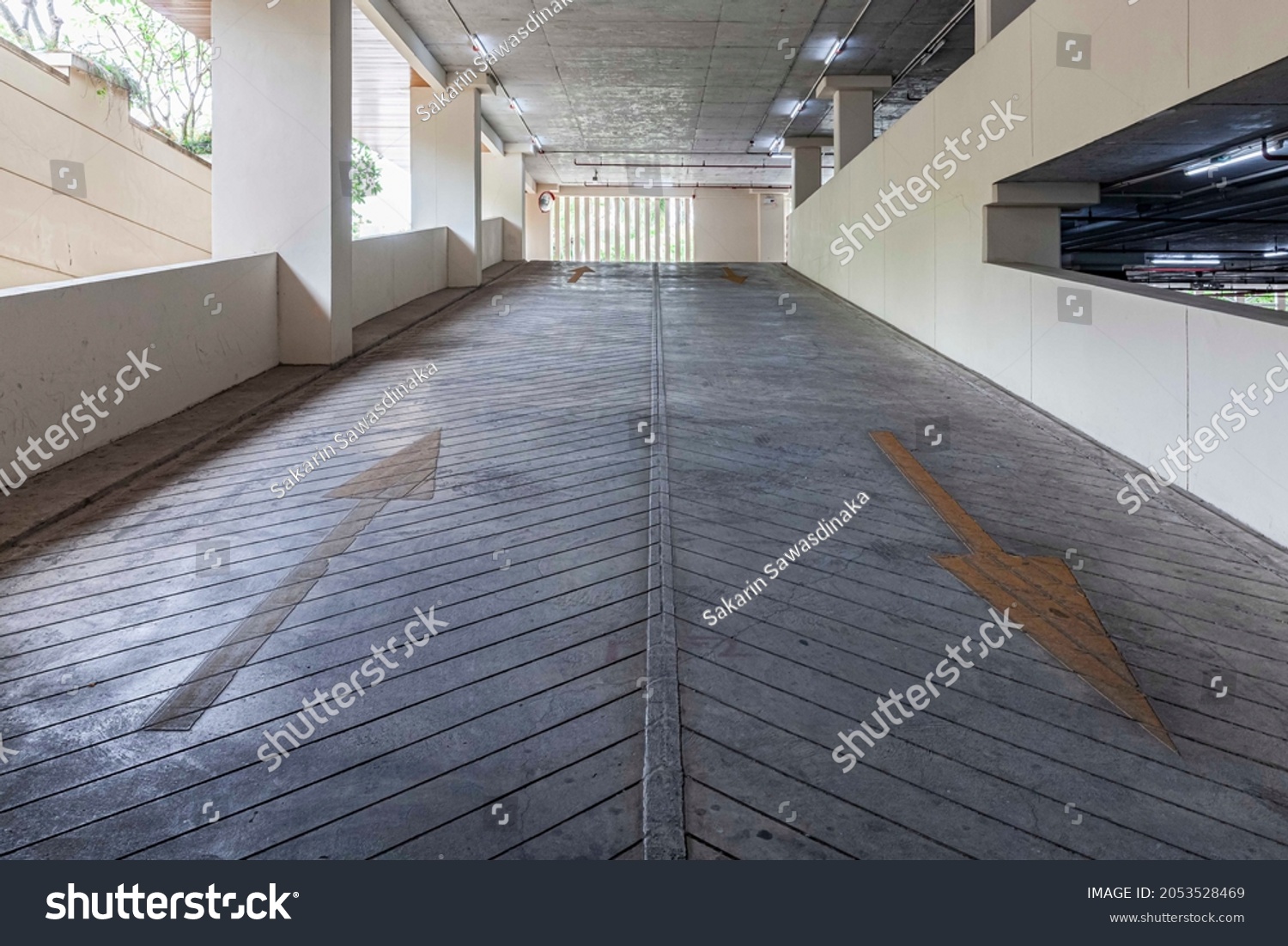 Empty Concrete passageway inside the car park building at the office building #2053528469