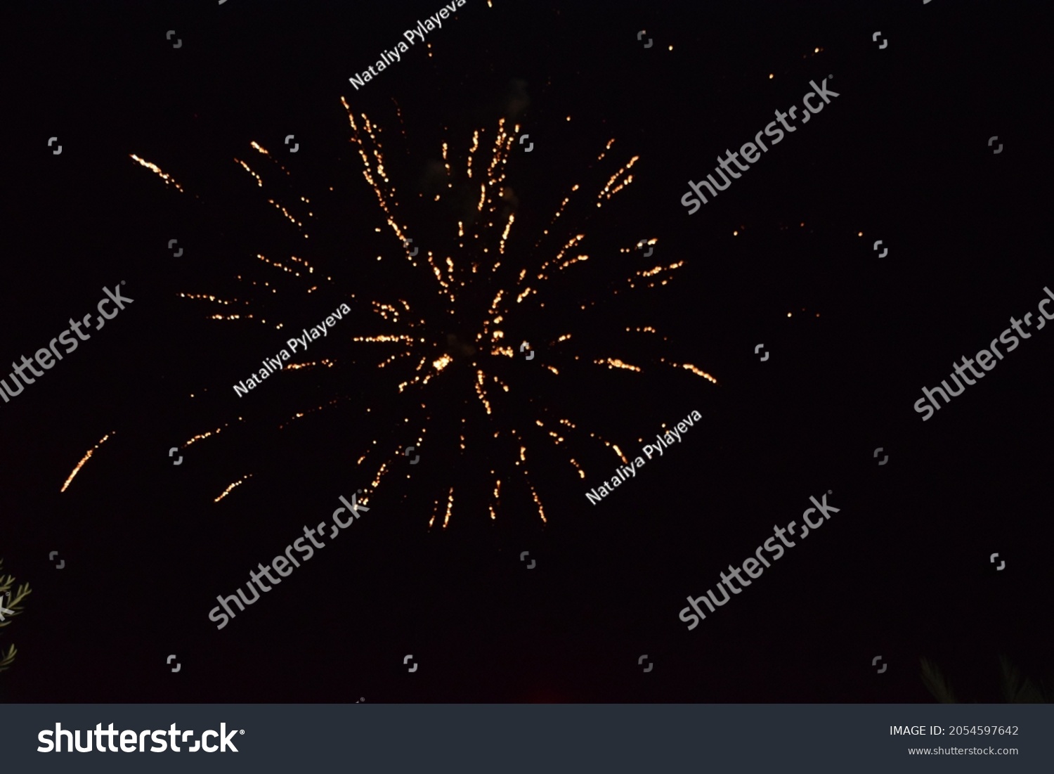  fireworks, splashes of light in the black night sky, holiday. High quality photo #2054597642