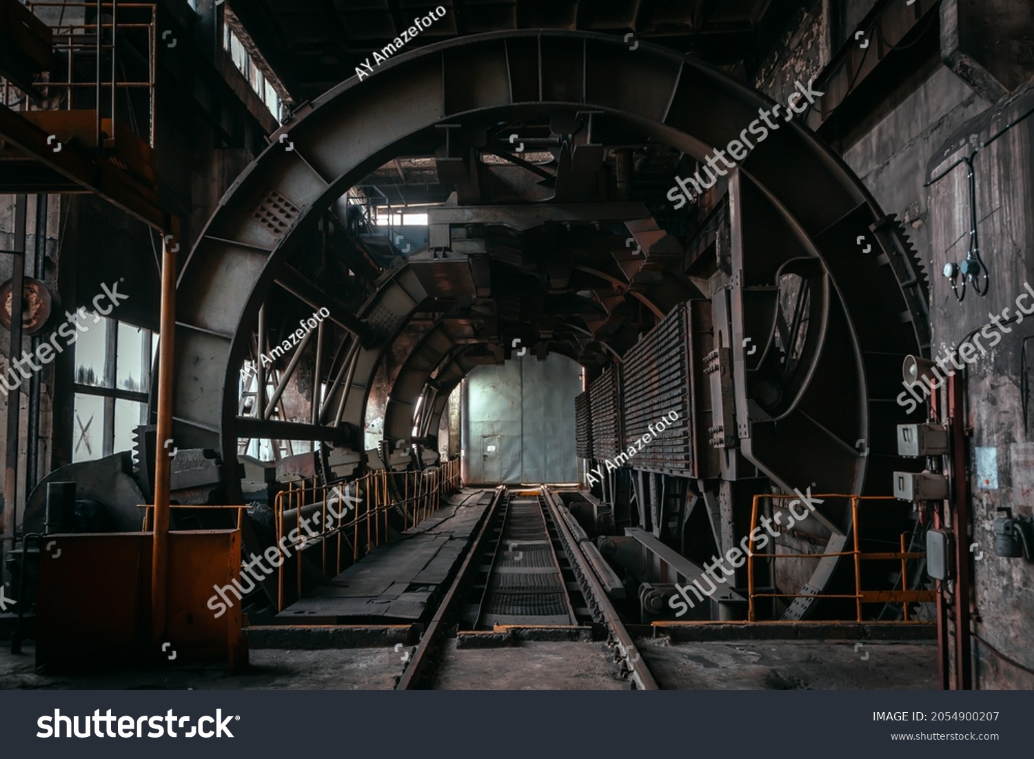 Abandoned mining facility equipment. Industrial interior #2054900207