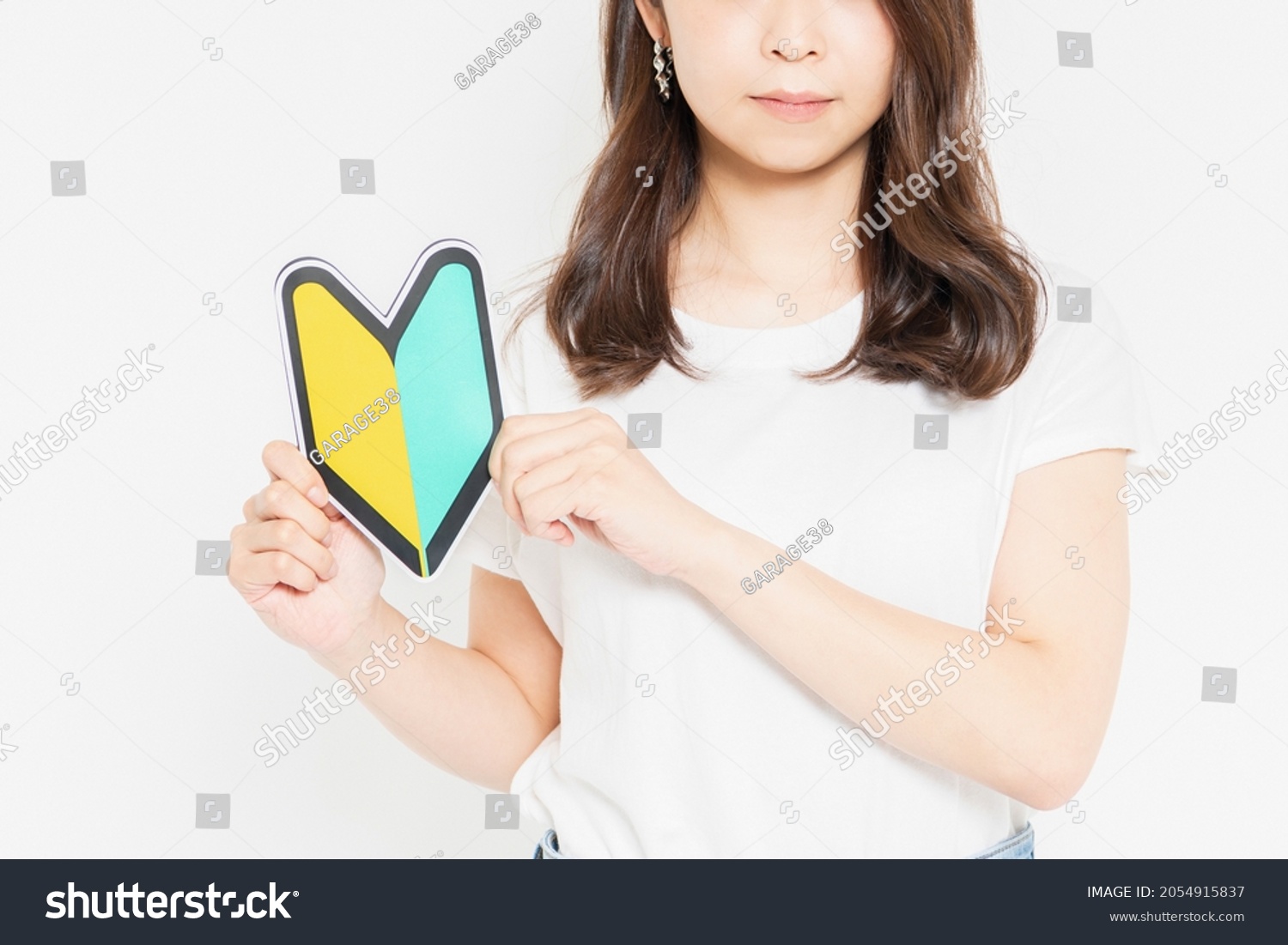 Young woman in a T-shirt with a beginner mark #2054915837