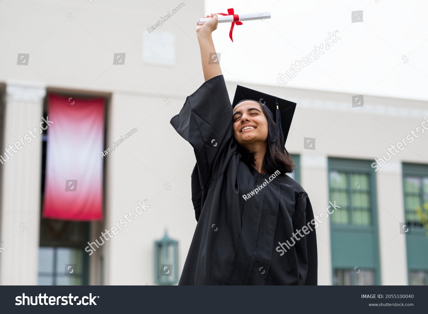 Girl graduating high school, celebrating academic achievement #2055100040