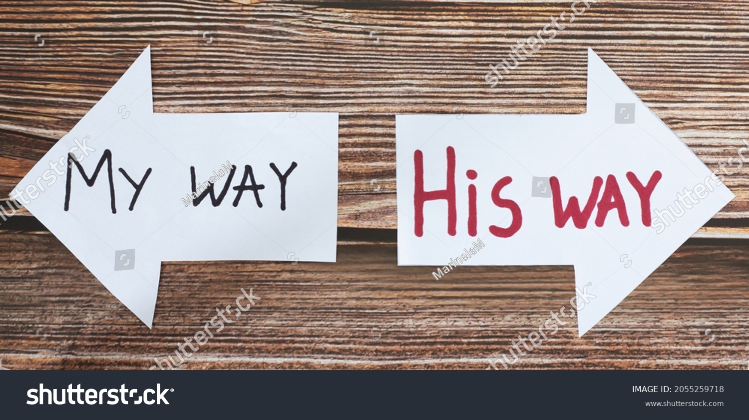 God Jesus Christ way of life. Choose the path to eternal life. Follow God. The biblical concept of godly wisdom, guidance, leading, and Christian growth. Handwritten words on paper arrows. A closeup. #2055259718