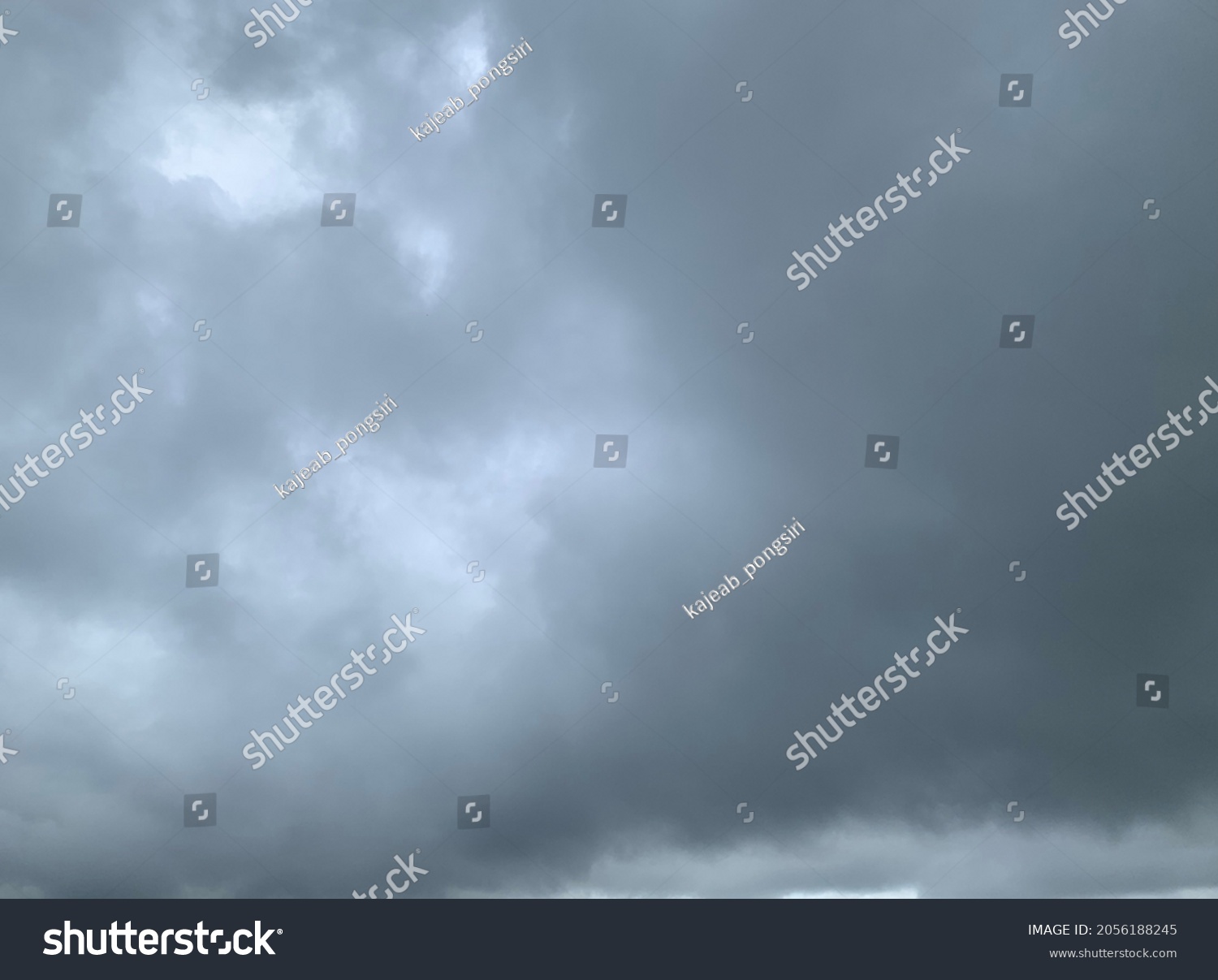 Dramatic landscape of stormy sky Nimbostratus Clouds A gray Style rolls and Huge scary storm it's going to rain heavily.no focus #2056188245