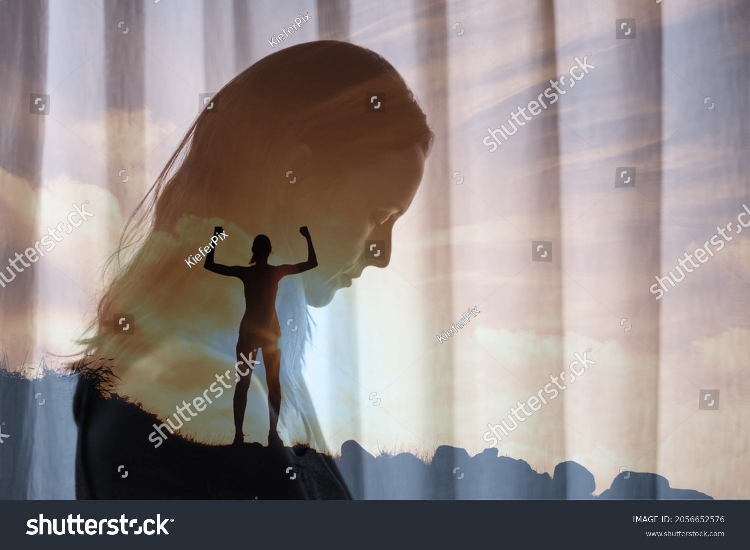 Brave strong woman standing on a mountain overcoming her mental fears. fighting self doubt, depression, sadness concept. double exposure #2056652576