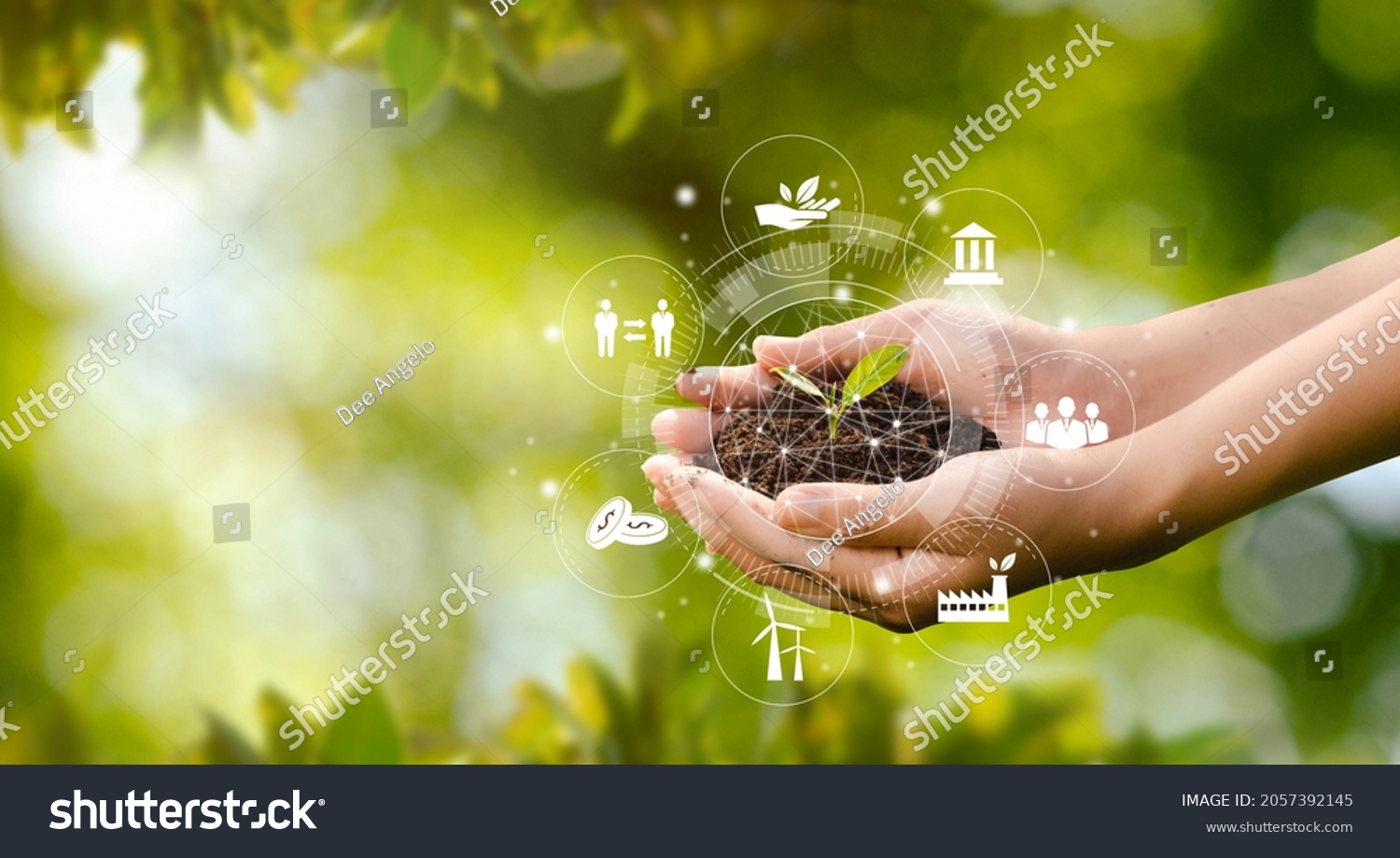 Hand planting trees with technology of renewable resources to reduce pollution ESG icon concept in hand for environmental, social and sustainable business governance. #2057392145