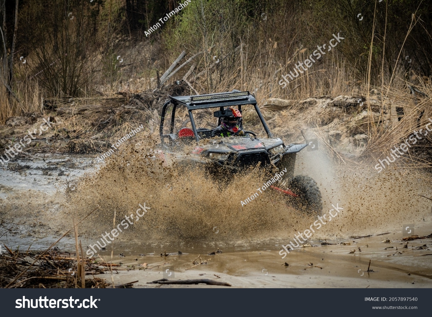 ATV, UTV, 4x4 driving in muddy water #2057897540