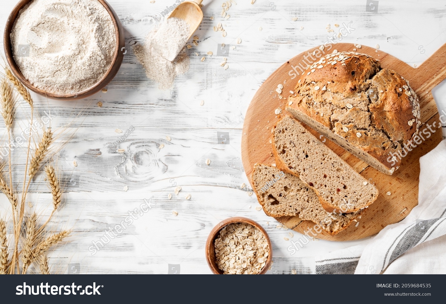 Traditional Irish Soda Bread whole grain flour for healthy lifestyle. White wooden background, top view #2059684535