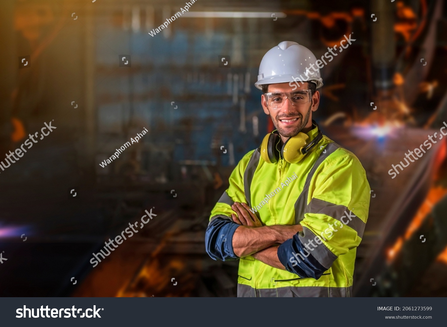 Portrait of Engineer with craftsman tool blurred backgrounf in the factory #2061273599
