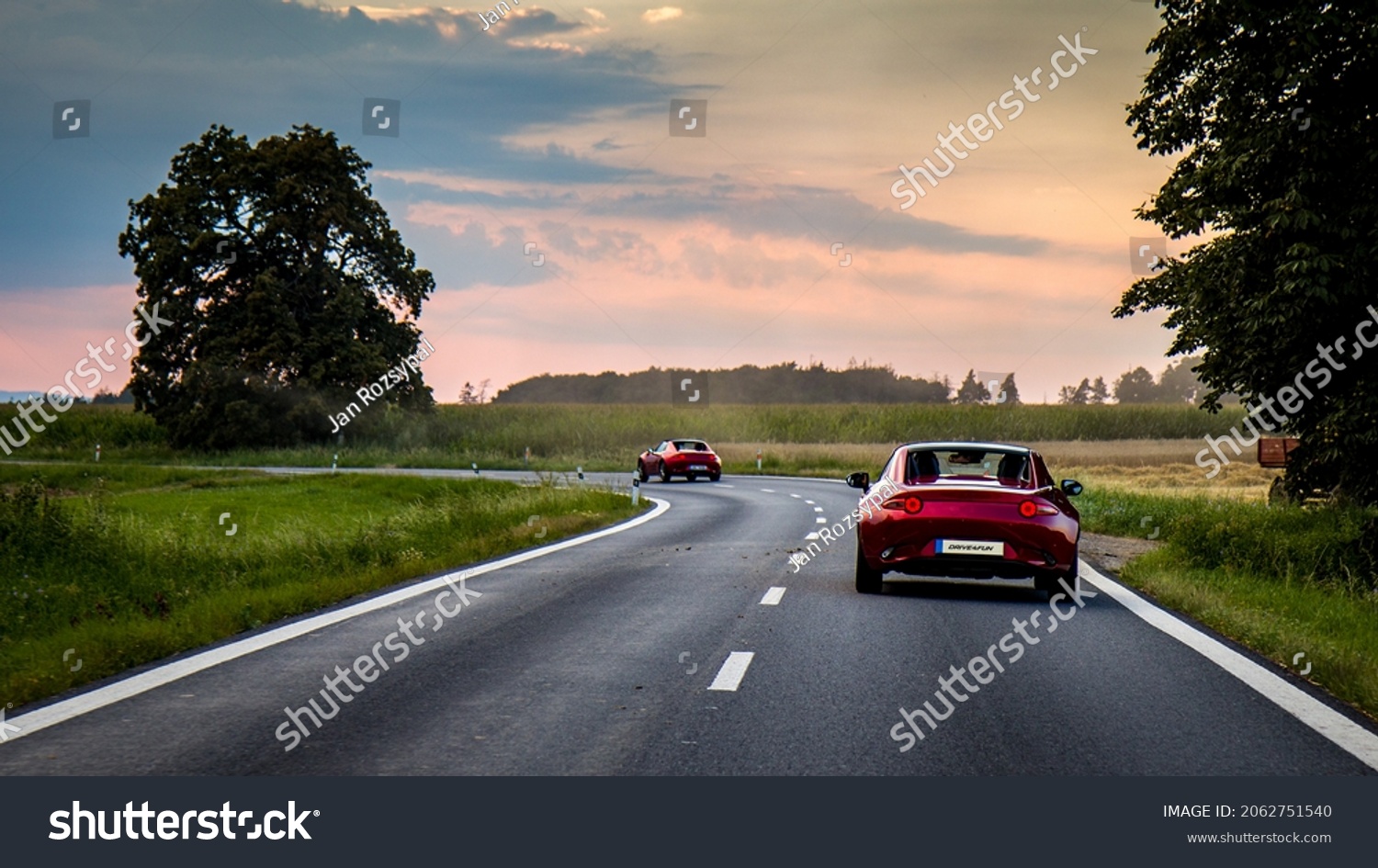 2 Sports cars on amazing winding district road - driving for fun. Mazda MX-5 ND RF. Miata. Amazing winding road. Green background HD. Wallpaper 4k. #2062751540