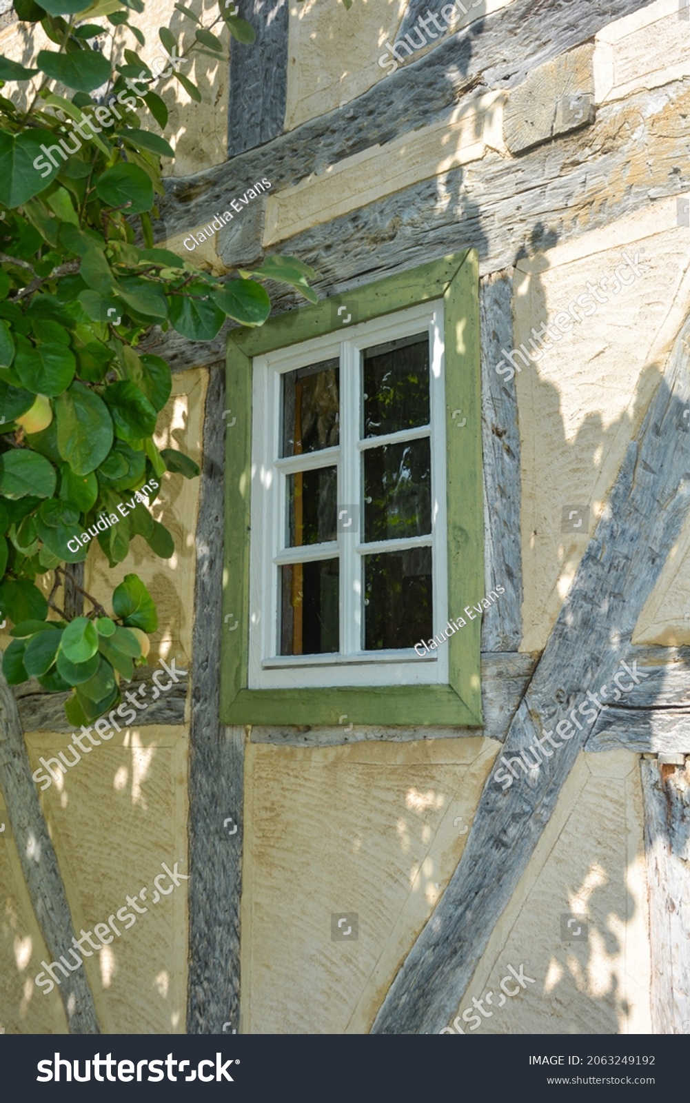 Old window from bygone times on a half-timbered house #2063249192