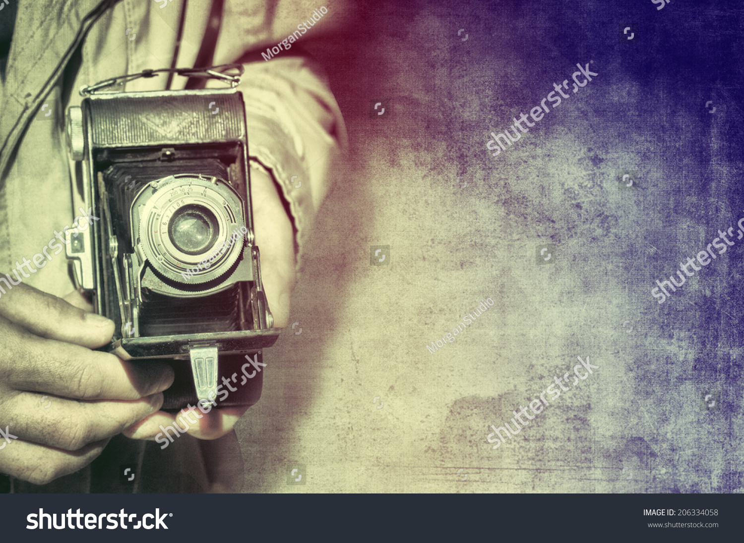 Photographer with vintage camera #206334058